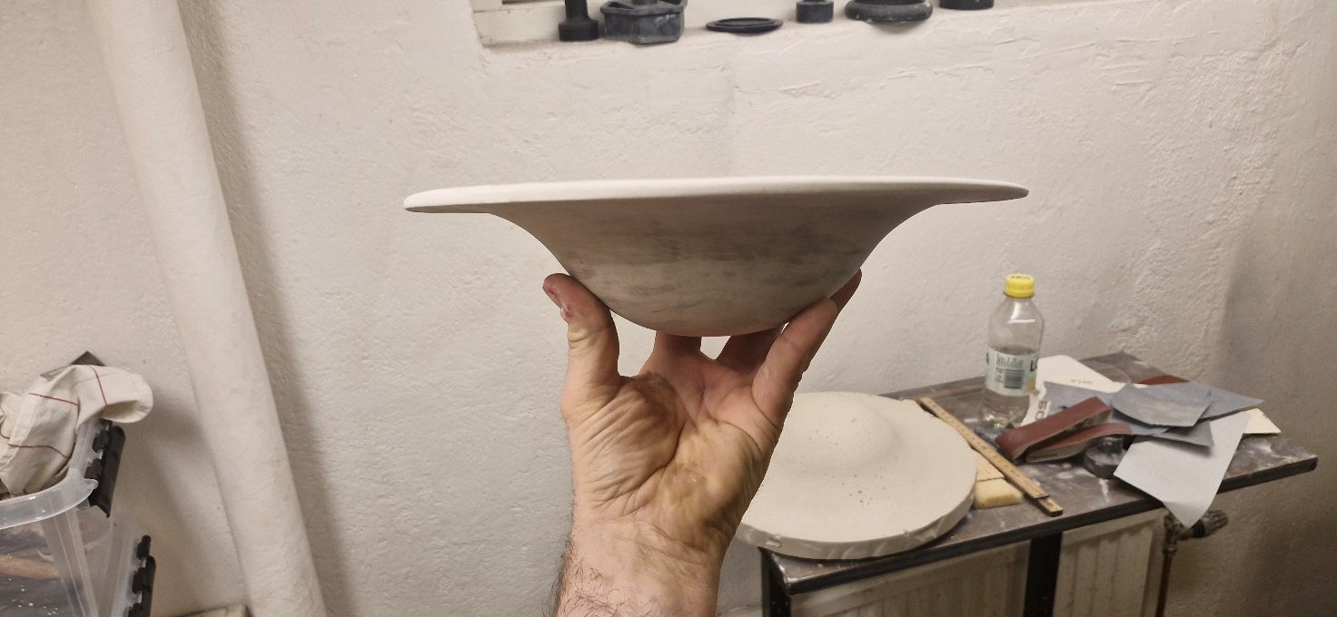 Fine dining plate draped over plaster mould